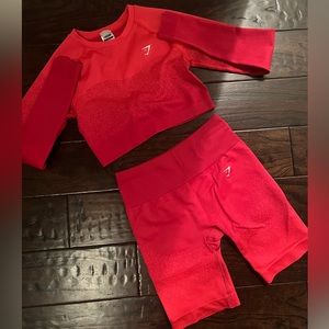 Gymshark adapt seamless ombré crop top and ombré biker shorts in pink/red